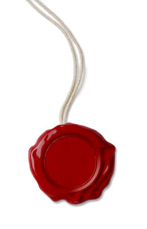 Old red wax seal with thread isolated on whiteの写真素材