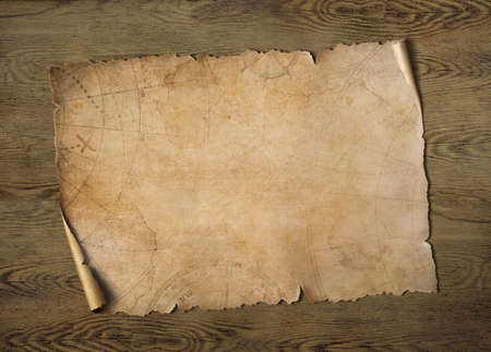 Old treasure map on wood table 3d illustrationの写真素材