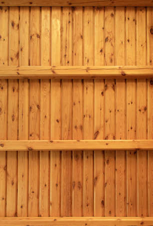 Two empty wooden shelves or rackの写真素材
