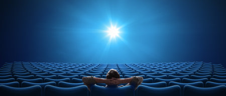 Cinema with one person sitting in 21:9 cinemascope formatの写真素材