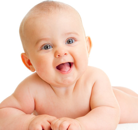 Adorable baby boy lying isolatedの写真素材