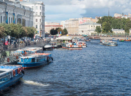 boats Moored on the embankment of the Fontanka river in St. Petersburg, Russia.のeditorial素材
