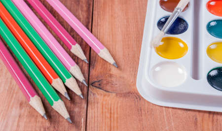 Accessories for painting, Colorful paint, brushes on white backgroundの写真素材