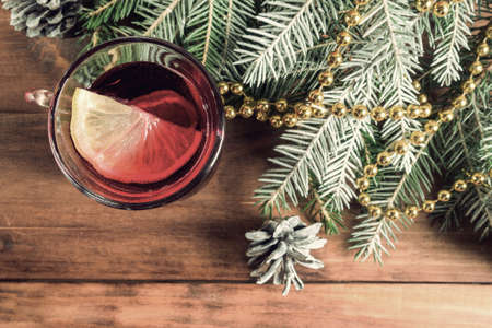 Christmas mulled wine with fir tree and decorの写真素材