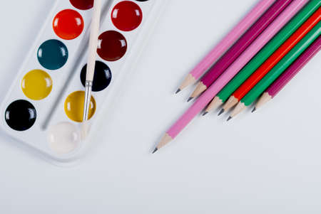 Accessories for painting, Colorful paint, brushes on white backgroundの写真素材