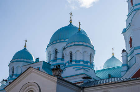 Domes of an Orthodox church against a blue sky on a sunny afternoon. Spaso-preobrazhenskiy Cathedral の写真素材