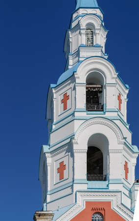 Belfry in a Christian monastery against the blue sky. Spaso-preobrazhenskiy Cathedral の写真素材