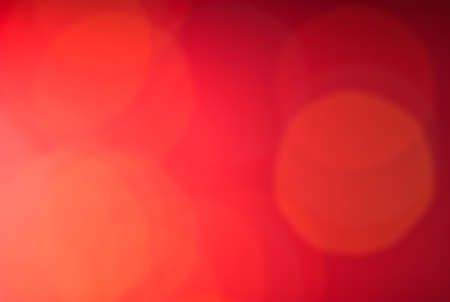 Dark red abstract background with bokehの写真素材