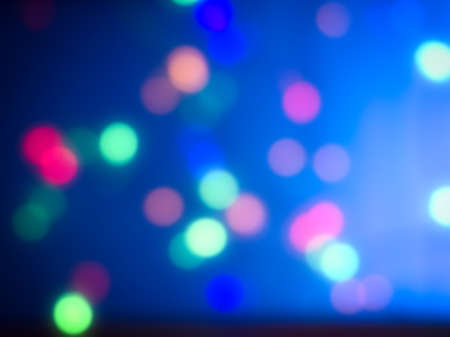 Abstract blue blurred background with bokehの写真素材