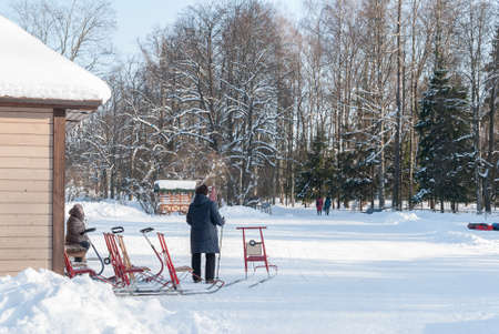 Pavlovsk, St. Petersburg, Russia - February 08, 2018: Rental in the winter park. People renting sleigh in Pavlovsk, St. Petersburg, Russiaのeditorial素材