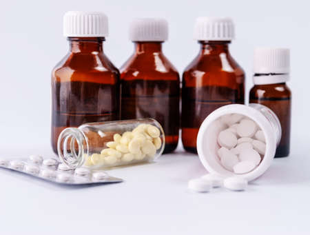 Capsule tablets and vials with medicinesの写真素材