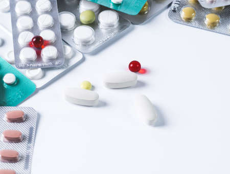 Pharmaceutical medicine pills and capsules on white backgroundの写真素材