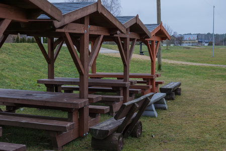 Wooden table and chairs in a park in the city of Kaliningradの写真素材