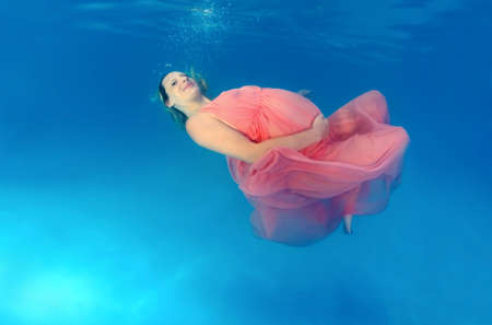 pregnant woman in a pool