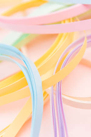 Paper strips in rainbow colors as a colorful backdropの写真素材