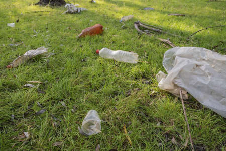 Plastic and other garbage thrown by tourists pollutes parks. Plastic garbage environmental pollution problem. Kartal Eco Park, Orlovka village, Reni raion, Odessa oblast, Ukraine, Eastern Europeの写真素材