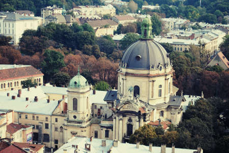 Autumn old city view on a cathedralの素材