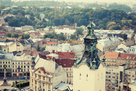 Autumn old city view on a cathedralの素材