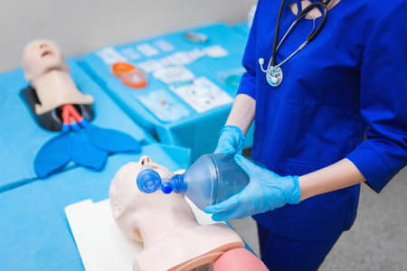 Artificial ventilation. introduction endotracheal tube (ETT) into trachea to ensure airway patency. doctor saves a lifeの写真素材