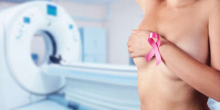 Female patient undergoing mammography test in hospital. Breast Cancer prevention concept.の写真素材