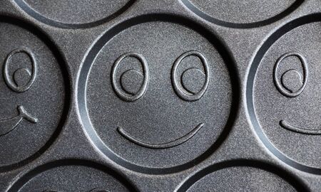 Frying pan for cooking cheerful smiling pancakes