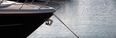 The bow of the yacht at sea anchored