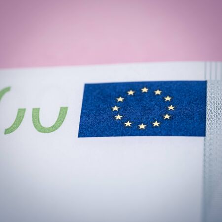 Euro cash on a lilac, purple and pink background. Euro Money Banknotes. Euro Money. Euro bill. Place for text.の写真素材