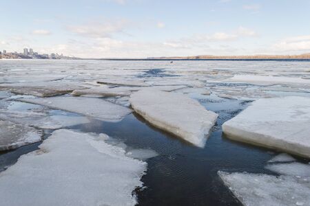 Spring ice drifting on the river. Background texture.