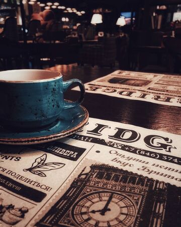 12.07.2019. Samara. A cup of tea or coffee, a bar, a restaurant, a newspaper.のeditorial素材