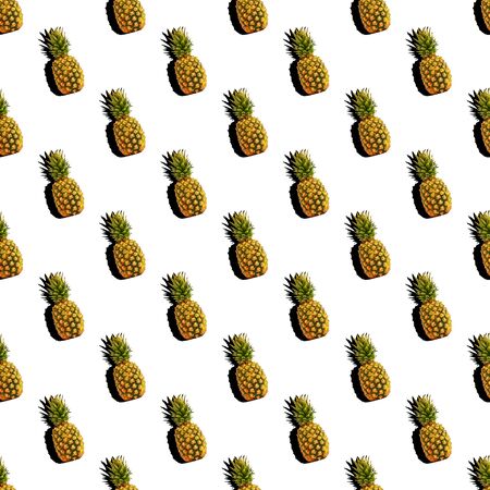 Seamless pattern with summer decoration of ripe pineapple with shadow. Tropical style concept background, wrapper, layout or mockup.の写真素材