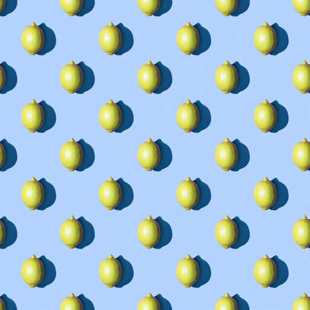 Lemon pattern on a plain background. Photo collage, mockup, layout, background for the project.の写真素材