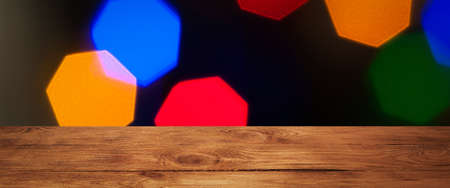 The background is an empty wooden board and a wall of blurred bokeh lights.
