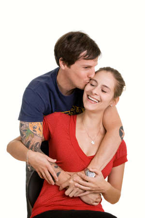 Happy young couple. Isolated on white