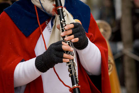 Playing on clarinet. Detail shot