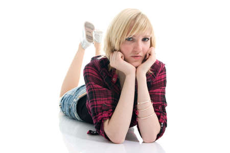 Beautiful teenage girl dreaming. Isolated on whiteの写真素材