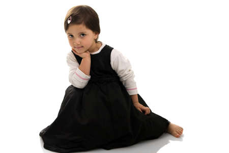 Cute little girl posing. Isolated on whiteの写真素材