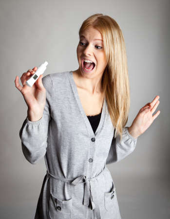 Young woman scared of pregnancy test resultsの写真素材