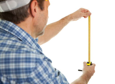 Confident worker measuring dimensionsの写真素材