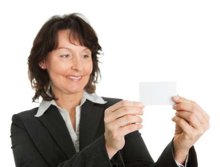 Businesswoman holding blank cardの写真素材