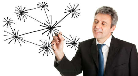 Businessman drawing a social network graph
