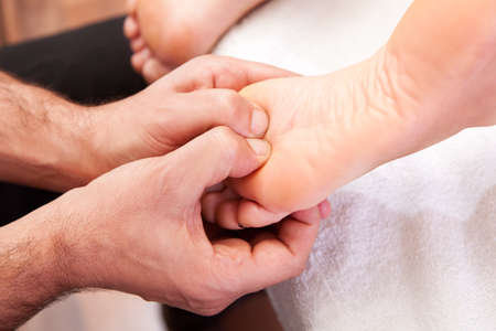 Foot massage close-upの写真素材