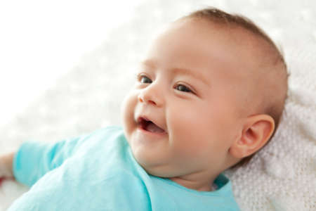 Closeup of a cute little baby smiling