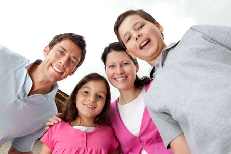 Portrait of cheerful young family together - Outdoorsの写真素材
