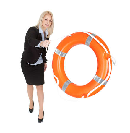 Beautiful businesswoman with life buoy. Isolated on whiteの写真素材
