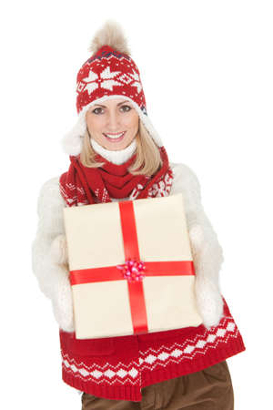 Beautiful woman in warm winter clothing. Isolated on whiteの写真素材