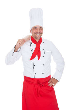 Portrait of a handsome cook. Isolated on whiteの写真素材