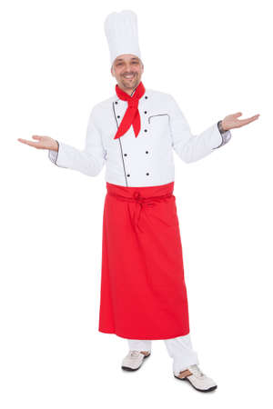 Portrait of a handsome cook. Isolated on whiteの写真素材