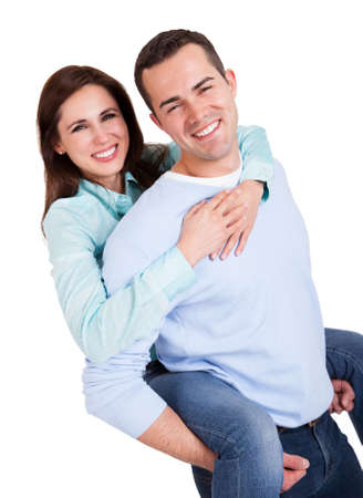 Portrait of beautiful young couple. Isolated on whiteの写真素材