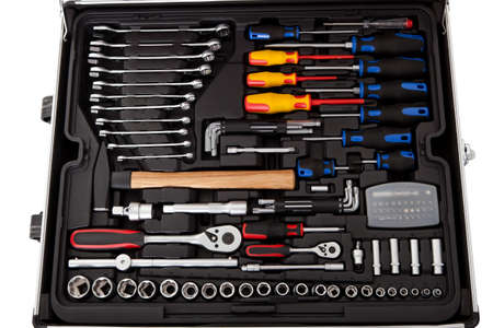 Suitcase full of various tools. Isolated on whiteの写真素材