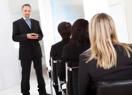 Group of successful business people at the lectureの写真素材